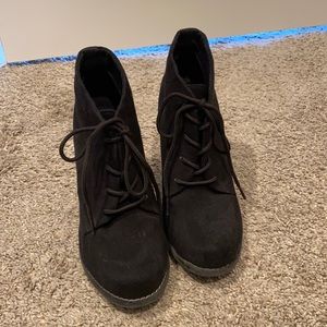 Black suede booties.